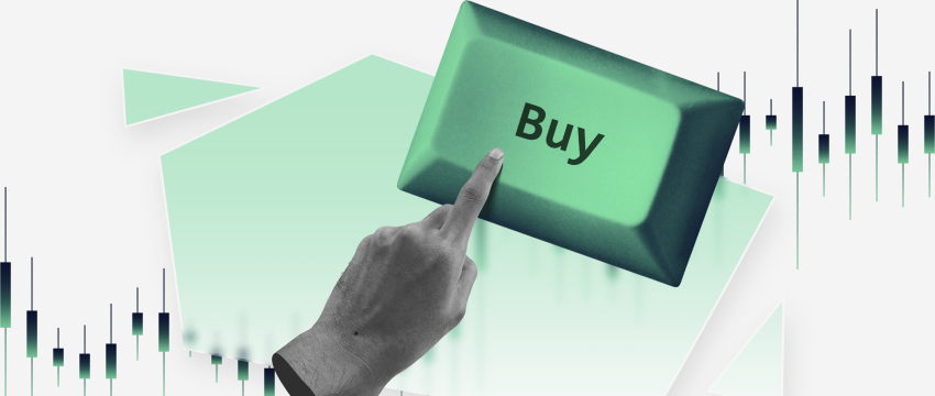 A hand reaching to press a green "Buy" button, overlaying a background of financial candlestick charts, suggesting investment decisions, with the concept of What is FOMO in trading influencing the urgency and emotional decision-making in the scene.