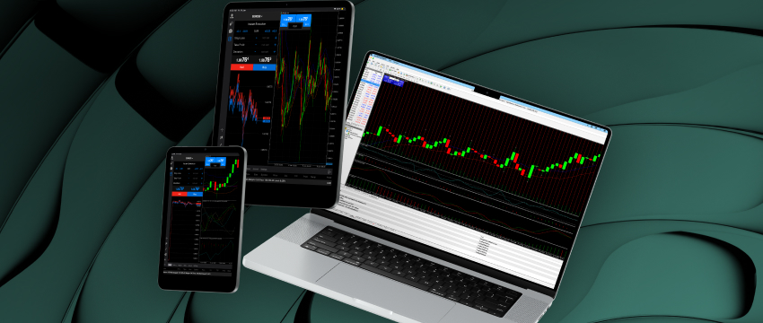 A multi-device setup featuring a laptop, tablet, and smartphone displaying live candlestick charts on a professional trading platform, perfect for identifying key price levels in support and resistance trading.