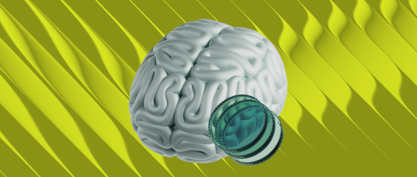 A 3D model of a human brain with a transparent glass wheel attached to its side, set against a wavy lime-green background, illustrating core trading psychology tips regarding mindset and discipline.