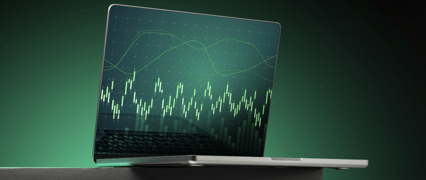 Forex trading chart on a laptop illustrating market spreads and price movements